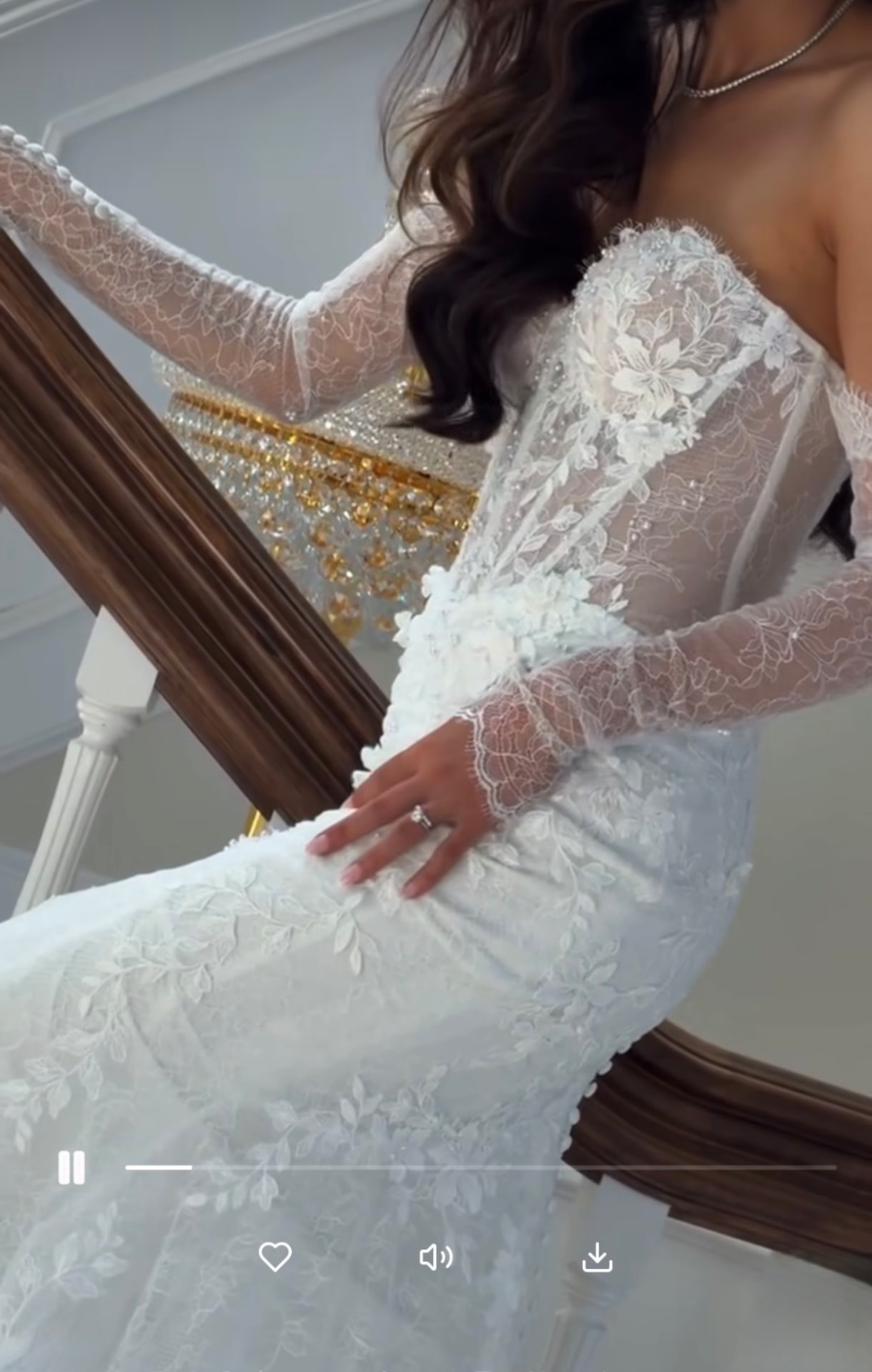 Bride on a staircase viewed full screen in the gallery