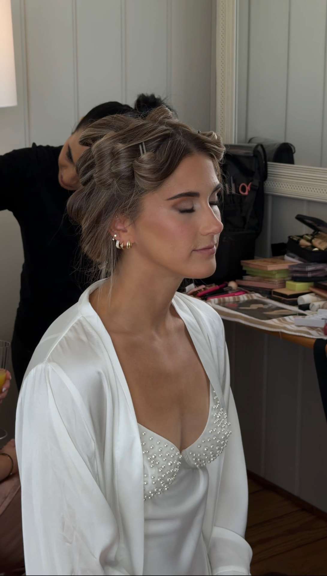 Bride with hair pinned during preparations